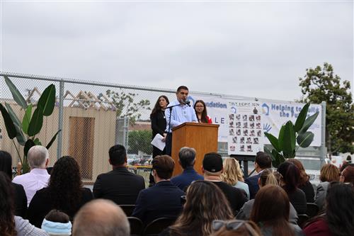 Mr. Diaz, Lizzy and Allison welcoming the guests the the ribbon cutting ceremony.